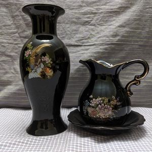 Beautiful black painted vases with lovely scene